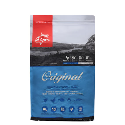 ORIJEN dog food packaging showing 340g, 1kg, 2kg, 6kg, 11.4kg and 17kg pack sizes